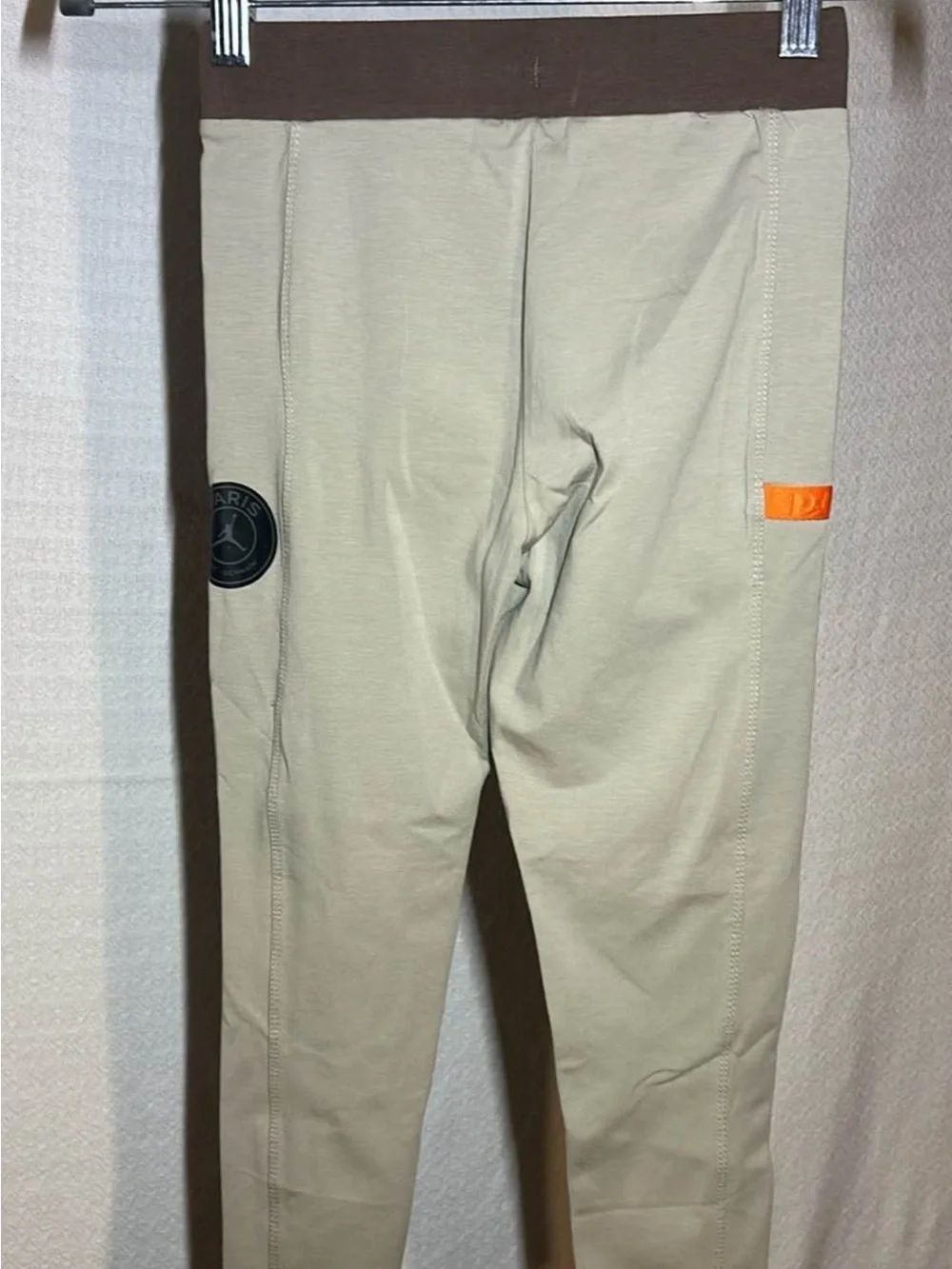 Jordan Men’s Light Gray Joggers with Orange Tab